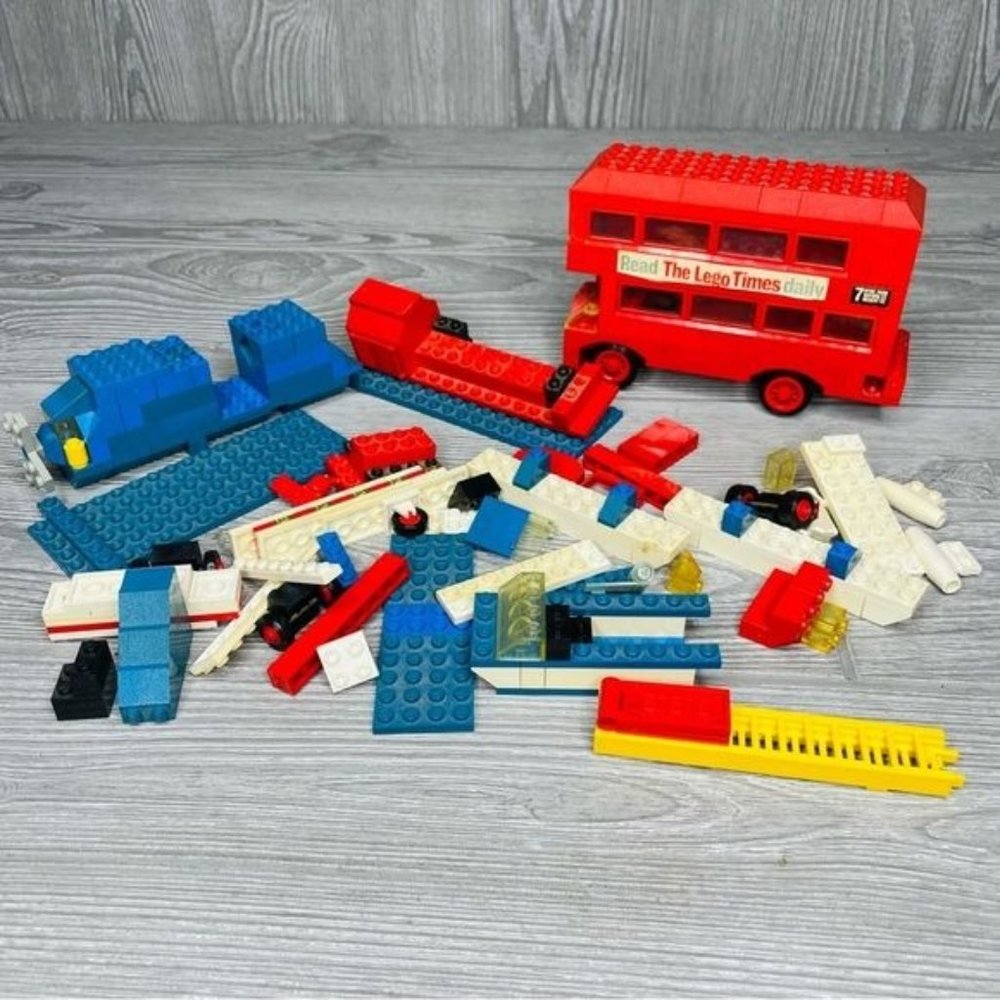Vintage 1970s lego sets bus , helicopter , boat , fire truck toy building blocks